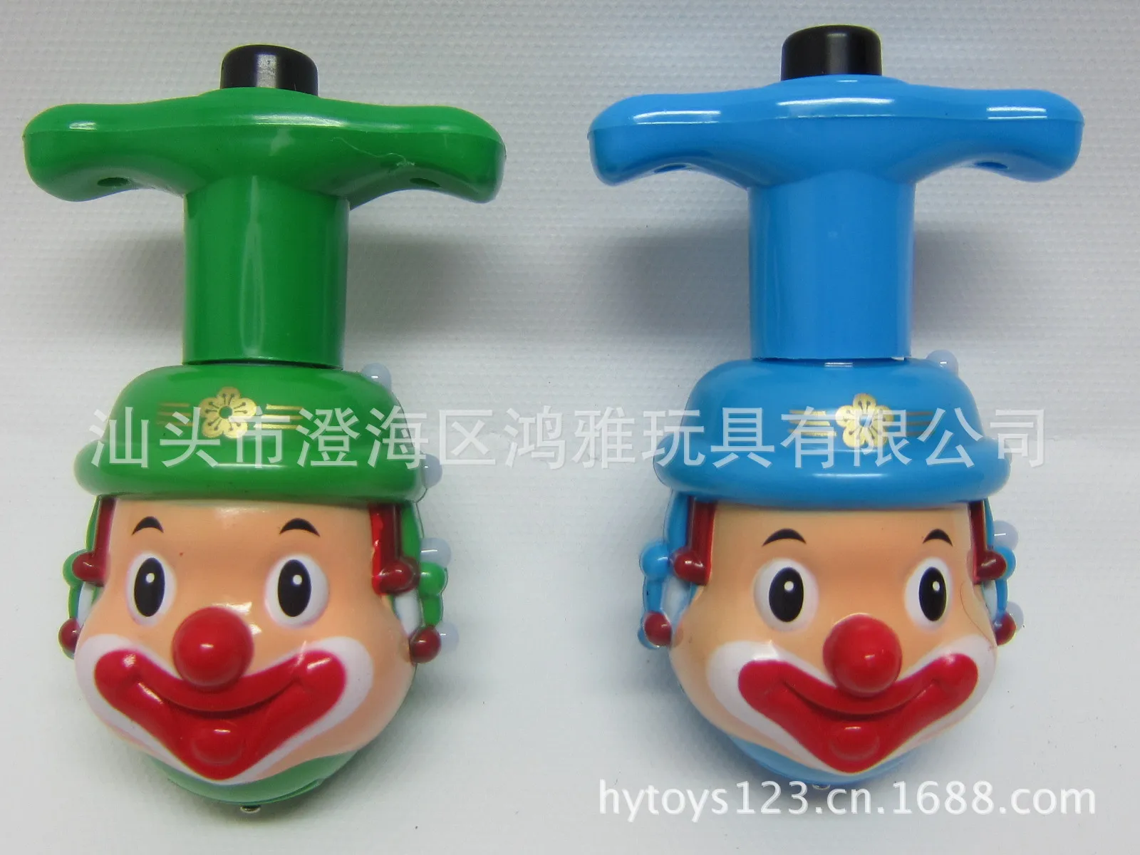 Manufacturers Direct Selling CHILDREN'S Plastic Toys Light Plastic Gyro Music Spinner Clown Spinner Hot Selling Cross Border