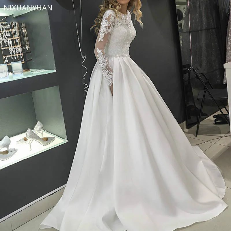 2020 O Hals Elegante Satijnen Trouwjurk Lange Mouwen Sweep Trein Vestidos De Novia Custom Made Bruidsjurken Kant Wedding jassen 2020 O Hals Elegante Satijnen Trouwjurk Lange Mouwen Sweep Trein Vestidos De Novia Custom Made Bruidsjurken Kant Wedding jassen
