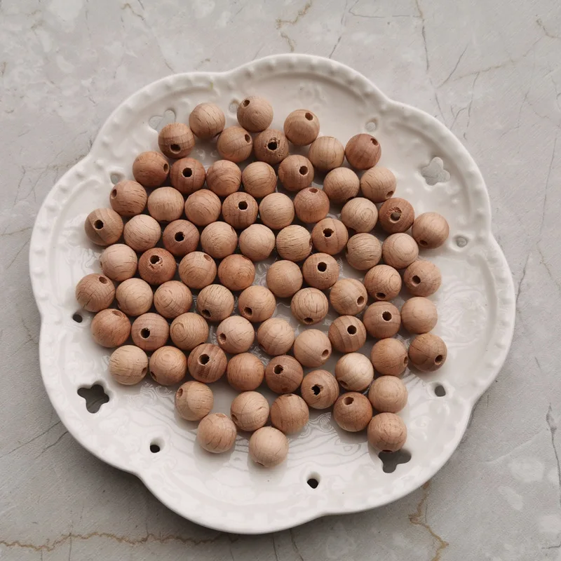 10Pcs/Set 12mm 15mm 20mm 30mm Natural Beech Wood Teether Beads Round DIY Wooden Baby Teething Beads for Pacifier Clips Making - Цвет: 12mm
