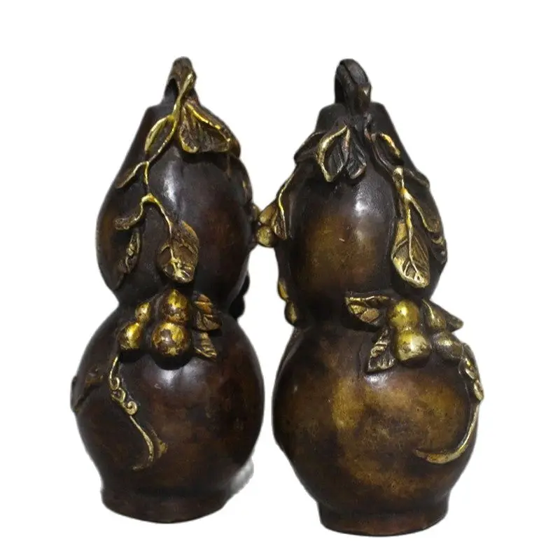 

A pair of antique gilded gourd and fortune to ward off evil in the house