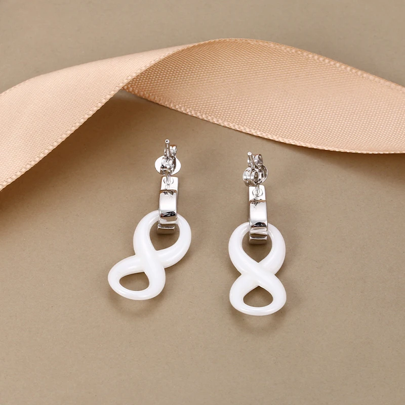 Nuovi orecchini da donna con simbolo dell'infinito in ceramica AAA Cubic Zirconia orecchino in ceramica bianca nera per gioielli da ragazza di natale di capodanno