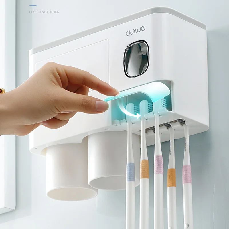 Baratos ONEUP nuevo soporte de cepillo de dientes dispensador automático de pasta de dientes con taza de montaje en la pared de artículos de tocador estante de almacenamiento accesorios de baño conjunto