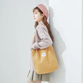 

Retro female bag Korean version of corduroy four-button buckle canvas female bag shoulder bag female crossbody bag handbag