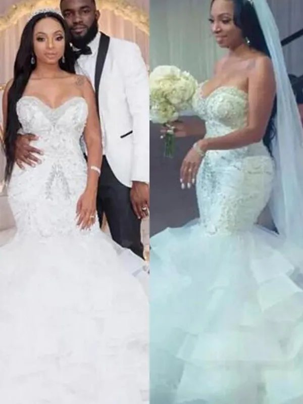 

Plus Size African Mermaid Wedding Dresses Sweetheart Sleeveless Beaded Crystal Tiered Skirts Tulle Sweep Train Black Girls