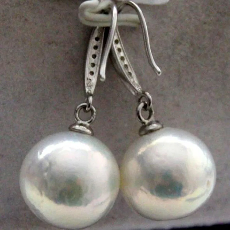 stunninga pair of 12-13mm natural round white pearl earring925s full drilled