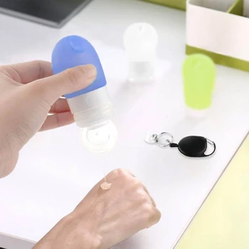 

Silicone Refillable Squeezable Hand Sanitizer Empty Bottle with Keychain Carrier K1MD