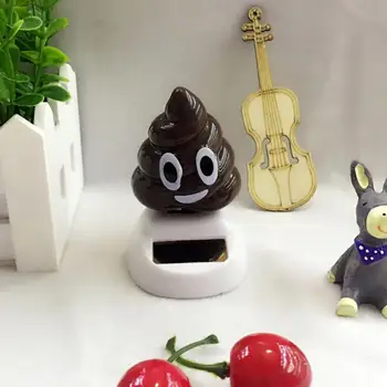 

Plastic Solar Power Shaking Poo Car Ornament Home Decor Flap Swing Dance Toy