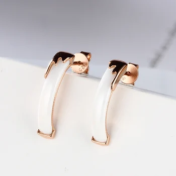 

Rose gold spring ceramic black and white small earrings female ear jewelry 925 sterling silver fashion beautiful does not fade