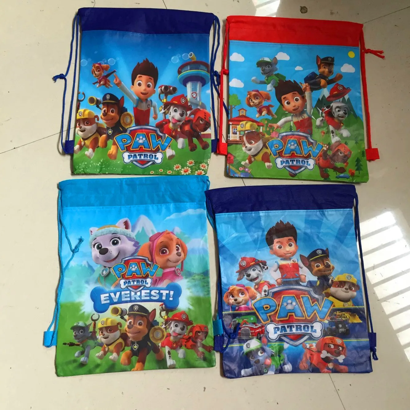 New Hot Paw Patrol Chase Marshall Everest Storage Bag Paw Patrol Zuma Skye Action Figure Bag Toy Party Decor Regalo Di Compleanno Per Bambini