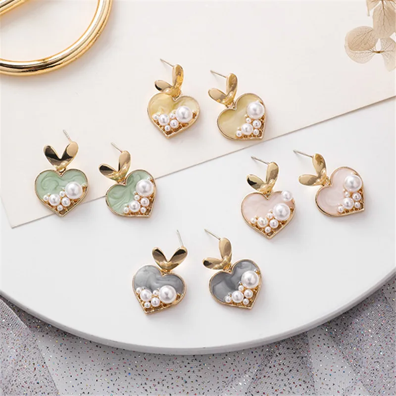 

Fashion Metal Heart earrings pearl contracted Metal hearts girl earrings small fresh Cute Romantic earrings for women jewelry 20