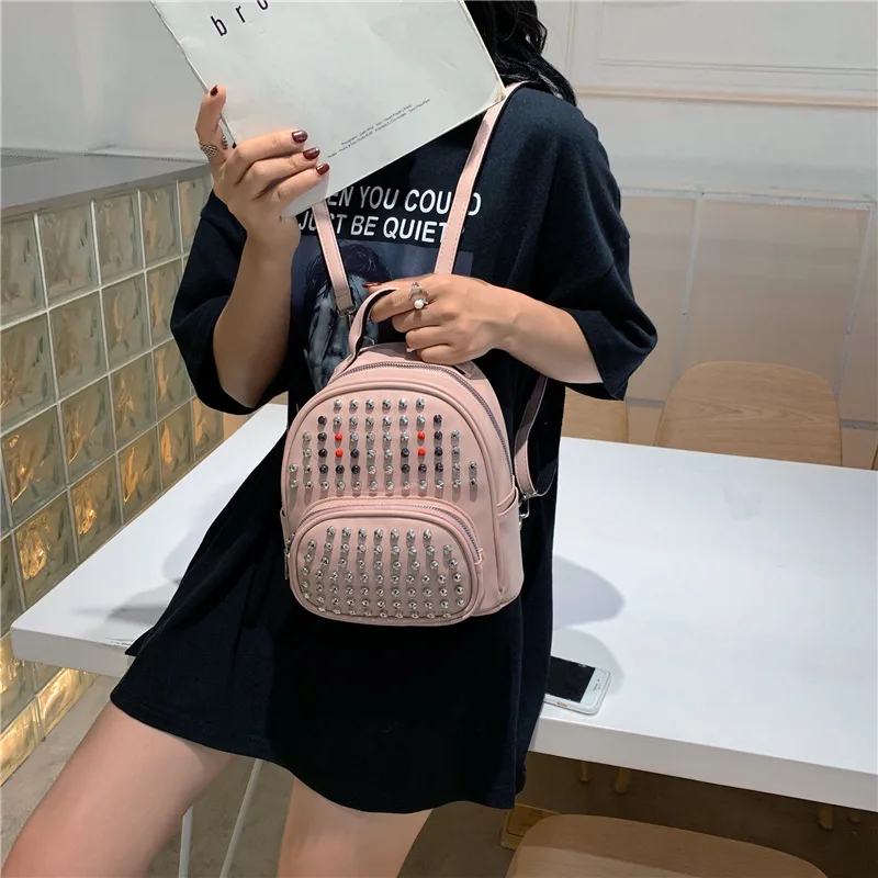 

Backpack 2019 Korean fashion backpack wild rivet shoulder bag shoulder slung student bag