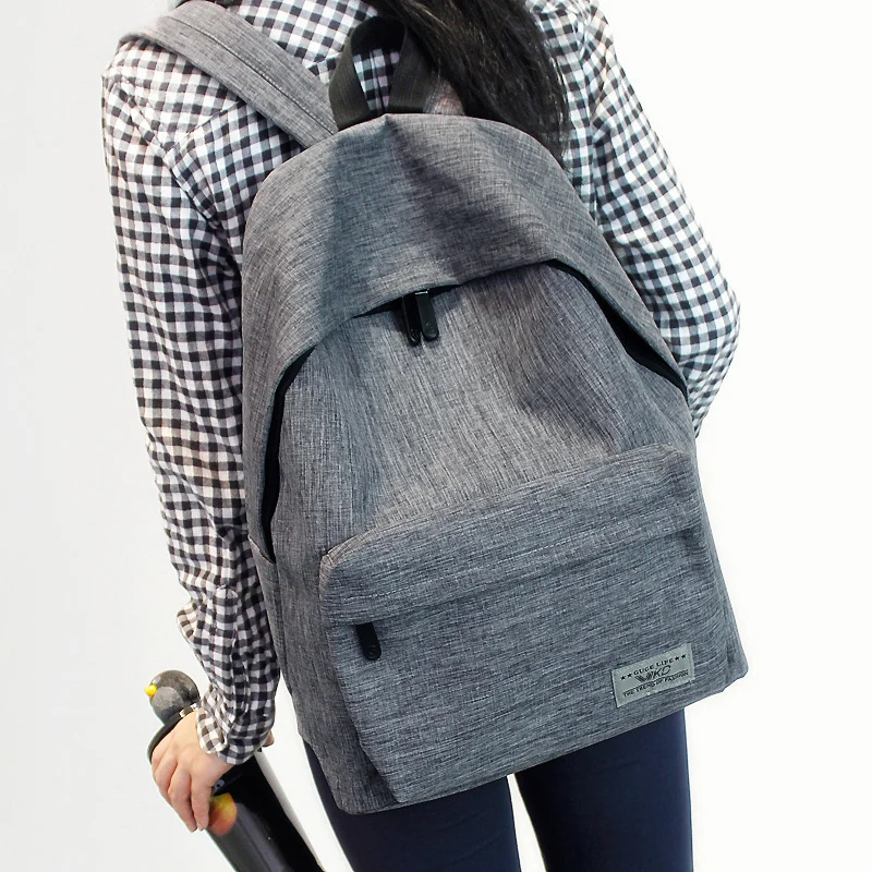 

Solid color simple shoulder bag female middle school student bag Oxford cloth tide small fresh college wind backpack men fashion