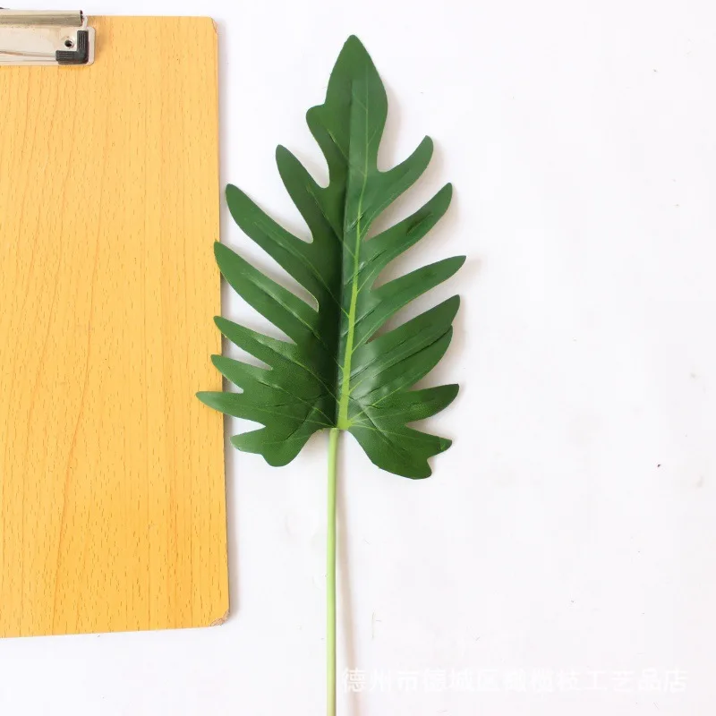 

Monolithic Small Spring Rain Leaf Handfeel High Quality Imitation Flowers Green Vegetation Flower Arrangement with Leaves Online