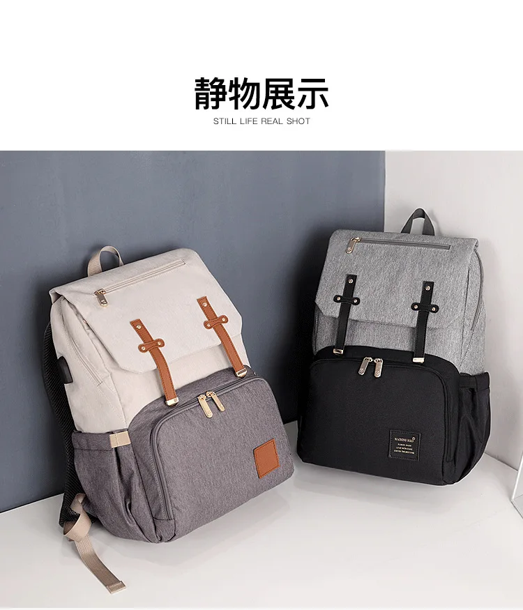 2019New Mummy bag multi-function hot mom shoulder bag large capacity personality fashion maternal and child package