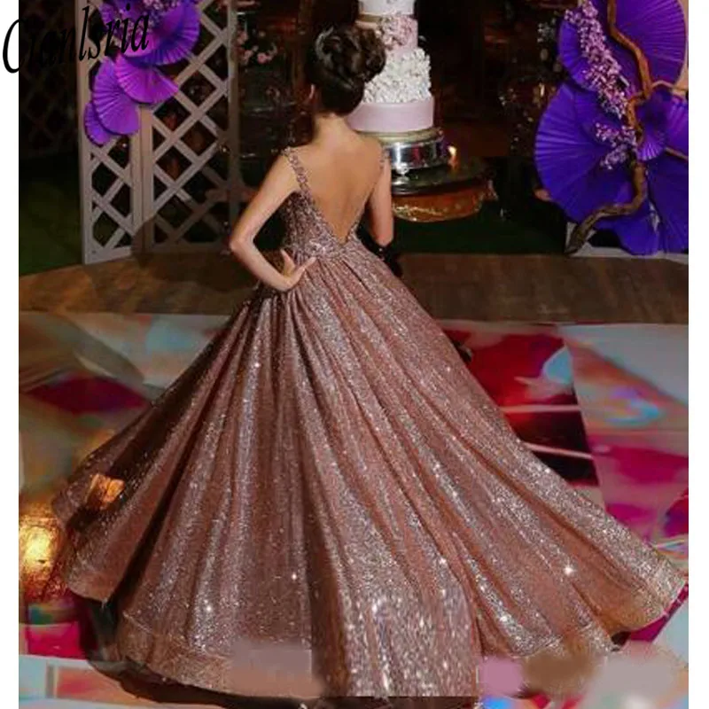 Moderne Rose Gold Afrikaanse Reflecterende Quinceanera Jurken Kralen Kristallen Backless Lovertjes Prom Jassen Sparkly Formele Party Dress Moderne Rose Gold Afrikaanse Reflecterende Quinceanera Jurken Kralen Kristallen Backless Lovertjes Prom Jassen Sparkly Formele Party Dress