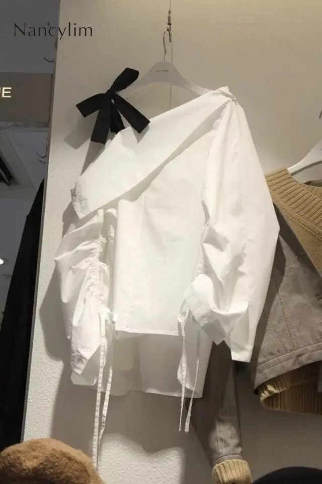 

2019 Spring Autumn Bat Shirt Woman New Korean Personality Oblique Collar Off Shoulder Strap Irregular Bow Shirt Casual Joker