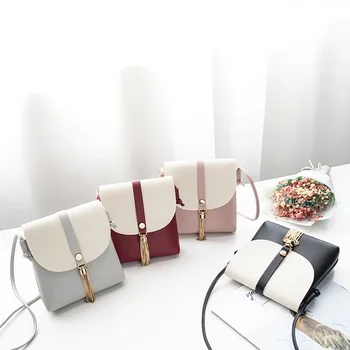 

Japanese and Korean fashion hardware tassel color single shoulder bag personality size change mobile phone slung handbag