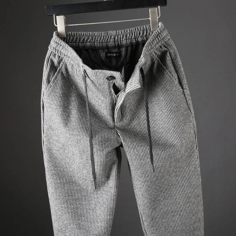 

JSBD brand autumn and winter thick woolen fabric casual sports pants men slim small feet handsome stripes men's pants
