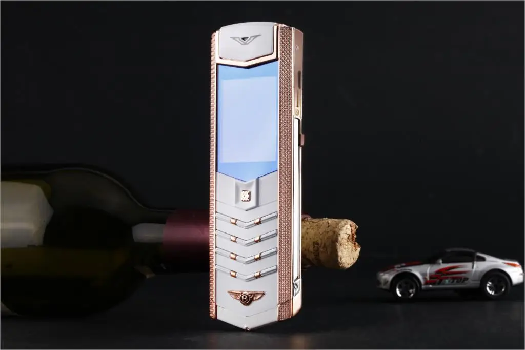 Бесплатный подарок, кожаные сумки V9 Meatl Body, роскошный барный телефон, две sim-карты, Bluetooth, набор номера, для старшего мобильного телефона, Невидимая клавиатура