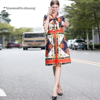 

Xiaomoli Retro printed bow V-neck geometric contrast knee length A-line dress 2020 summer new women's fashion
