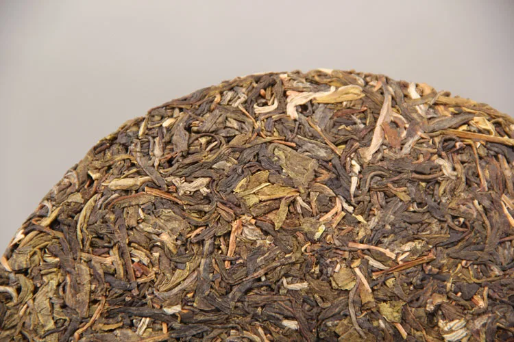Menghai Ранняя весна сырой Pu-erh Nannuo горный Qizi чай торт 357 г Shen Pu'er чай