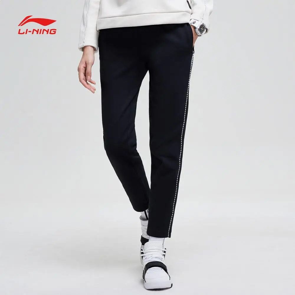 Женские баскетбольные спортивные штаны Li Ning флисовые теплые брюки из 66%