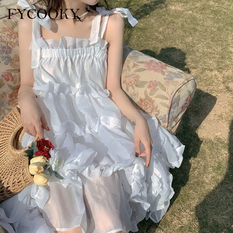 

New White Bow Bandage Dress Women Summer Chic Strap Fairy Princess Dress Female Casual Holiday Beach Midi Dress 2021