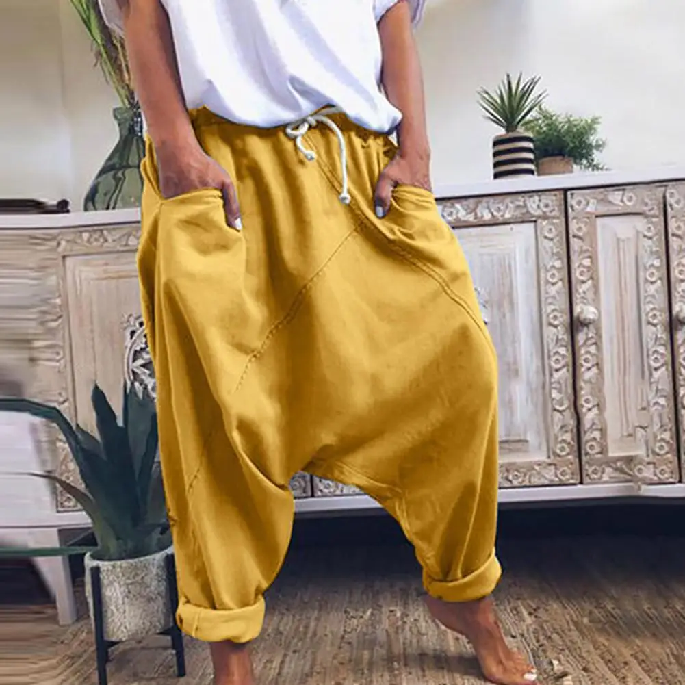 Pantalones largos holgados con bolsillos y cordón en la entrepierna para mujer, calzas Haren de Color liso para primavera y otoño