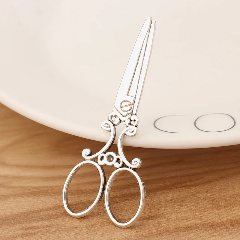 

10 Pieces Tibetan Silver 3D Scissors Sewing Hairdressing Charms Pendants for Necklace Jewellery Making 60x24mm