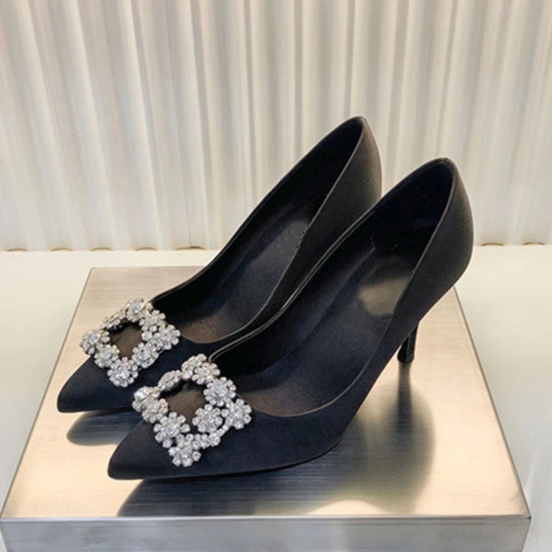 black satin pumps with rhinestones