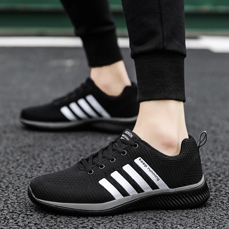

Mring sports shoes men and women flying woven mesh four seasons breathable wild casual light soft bottom fitness running shoes