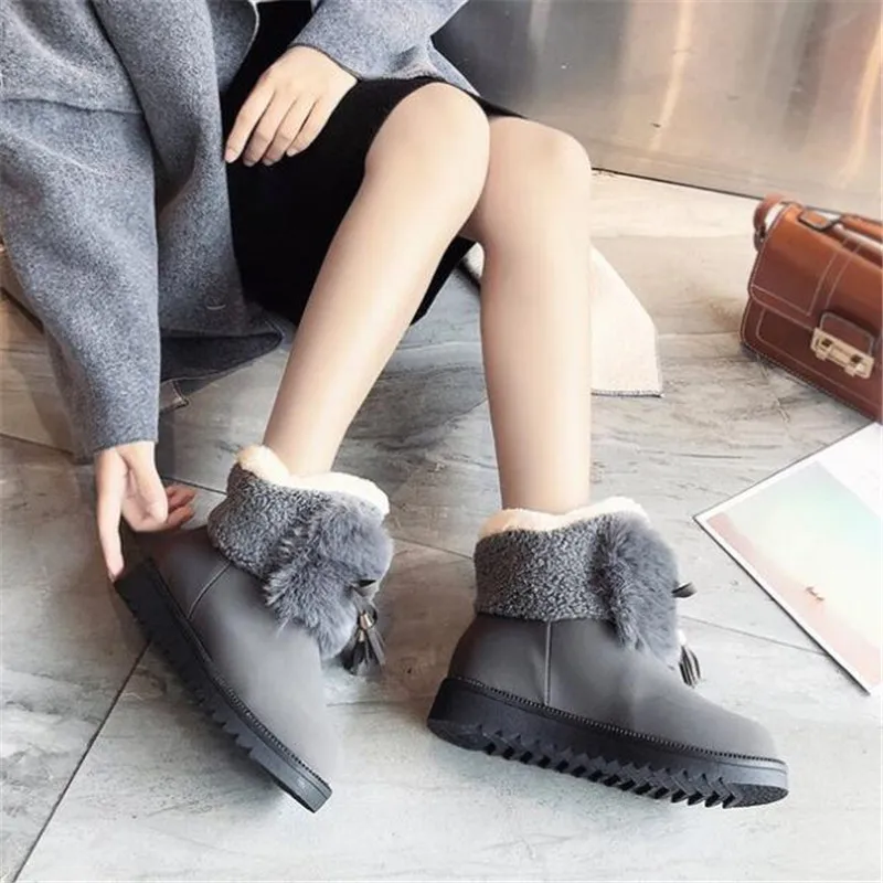 

Designer Snow boots female winter new versatile student female cotton short tube plus velvet warm women boots zapatos de mujer