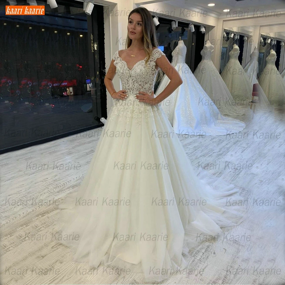

Boho Wedding Dress V Neck Sleeveless Abito Da Sposa Lace Up Appliqus Beaded Tulle Ball Gown Bride Dresses Women Long Custom Made