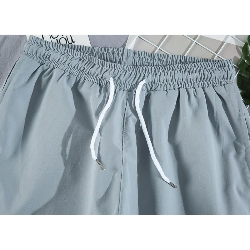 Men shorts thin 2021 new arrival summer Korean style loose male shorts letter patchwork plus size 4XL 5XL hot sale quick dry S27