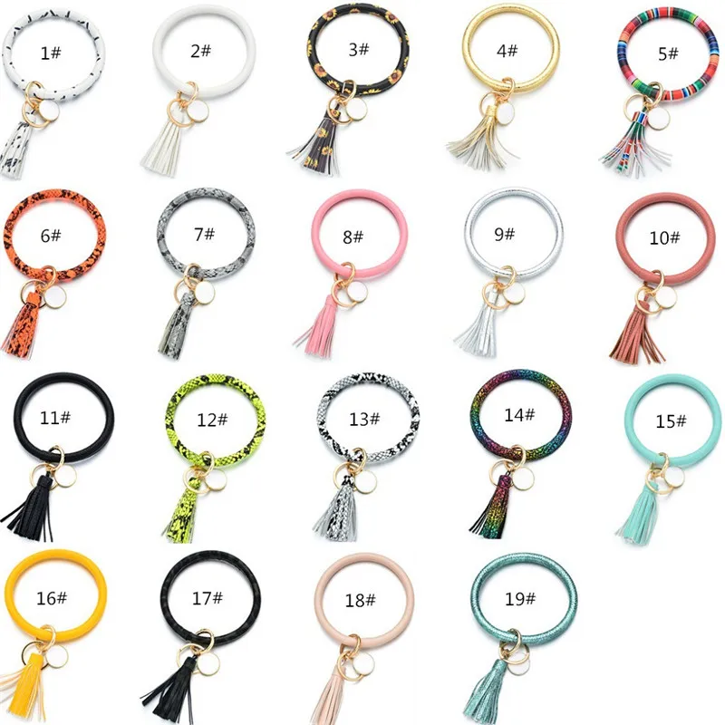 100 Teile/los Mode Regenbogen PU Leder Runde Quaste Armband Schlüsselring für Frauen Trendy Großen Kreis Gringe Spot Schlüsselbund Zubehör