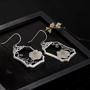 

Yiluyin S925 pure silver retro personality Hetian jade white jade plum inlay simple lady earrings earrings earrings