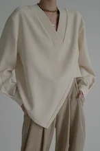 

2022 Spring Women Striped Irregular Cross Hem Shirt