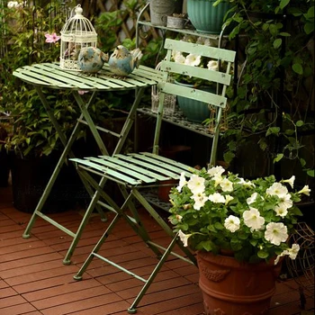 

Country retro wrought iron outdoor balcony folding table and chair garden leisure table and chair three-piece garden