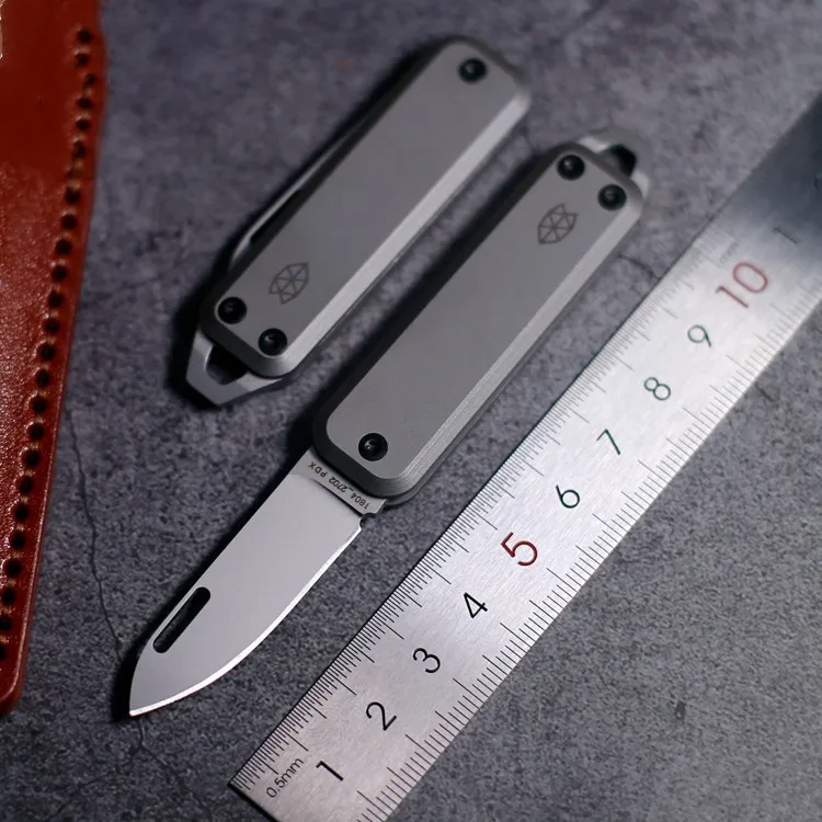 

Titanium Pocket Knife EDC Tool Knife Sharp Outdoor Folding Knife D2 Steel Key Pendant