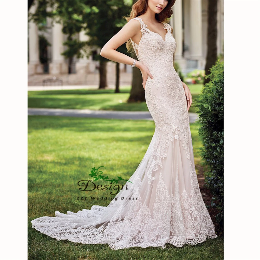

Luxury Mermaid/Trumpet Organza And Tulle Appliques Dropped Bridal Gown Court Train Ivory Wedding Dresses