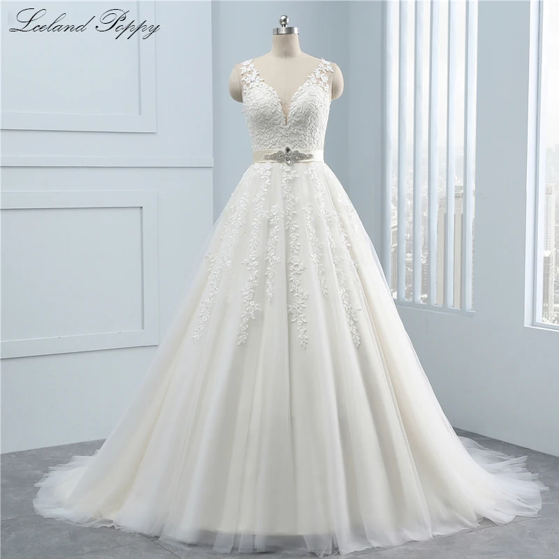 Реальные фотографии Vestido de Noiva A-Line Свадебные платья с v-образным вырезом без рукавов с кружевной аппликацией длиной до пола Свадебные платья с поясами
