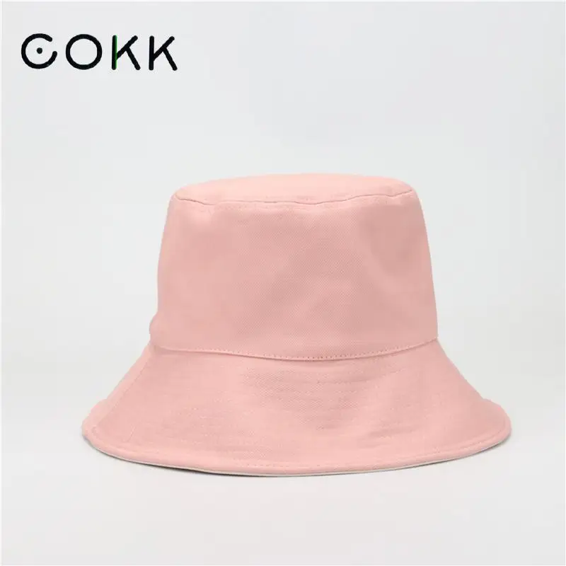 pink and black bucket hat