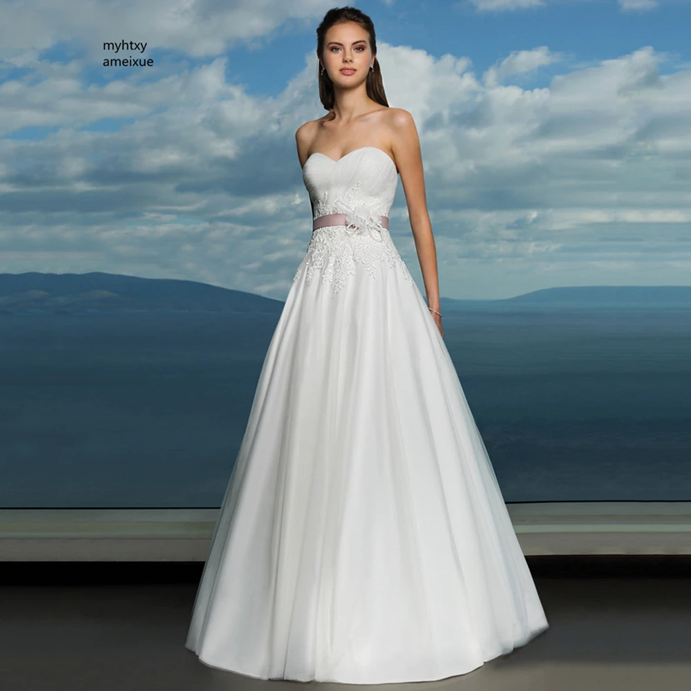 

Sleeveless Tulle Sweetheart Backless A-line Sleeveless Vintage Sexy Cheap Lace Belt And Flowers Wedding Dress 2019 Plus Size