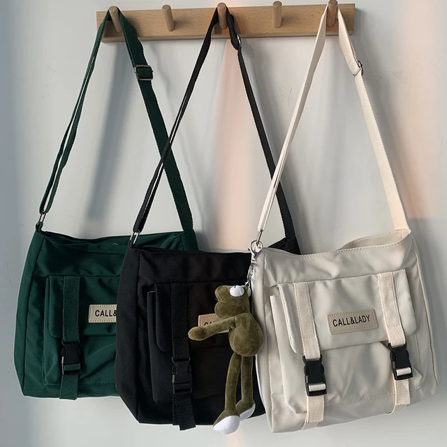 Moda klasik basit askılı çanta kadın güney kore şık postacı çantası bayan  öğrenci naylon su geçirmez tuval okul çantası - AliExpress
