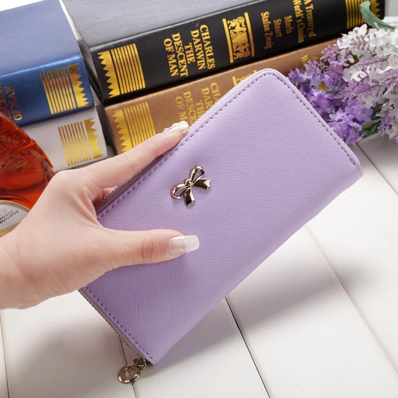 

2019 new wild cute solid color wallet Korean version of the cross pattern ladies wallet bow wear simple clutch bag