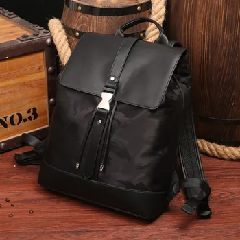 

2020 Backpack Shoulder Bag Korean Version of The Leather Business Bag Trend with Pumping Fashion Backpack Schoolbag Travel Bag