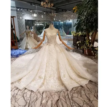 شراءBGW HT43011 فستان زفاف مثير بدون حمالات مع الحجاب الزفاف بلا أكمام يزين ثوب زفاف فاخر مع قطار طويل وصول جديد