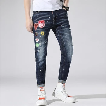 

Men's jeans with ink splashes 2019 new Korean version of the hole pants feet slim casual stitching pattern