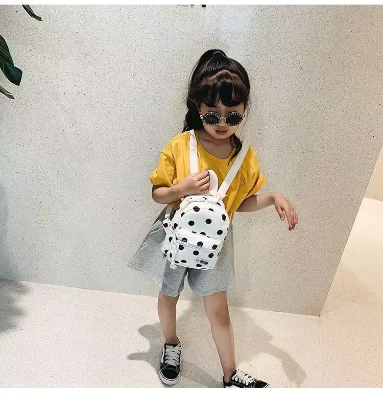 canvas Children's school bags Korean lovely wave point Leisure travel backpack for children Cartoon children small backpack