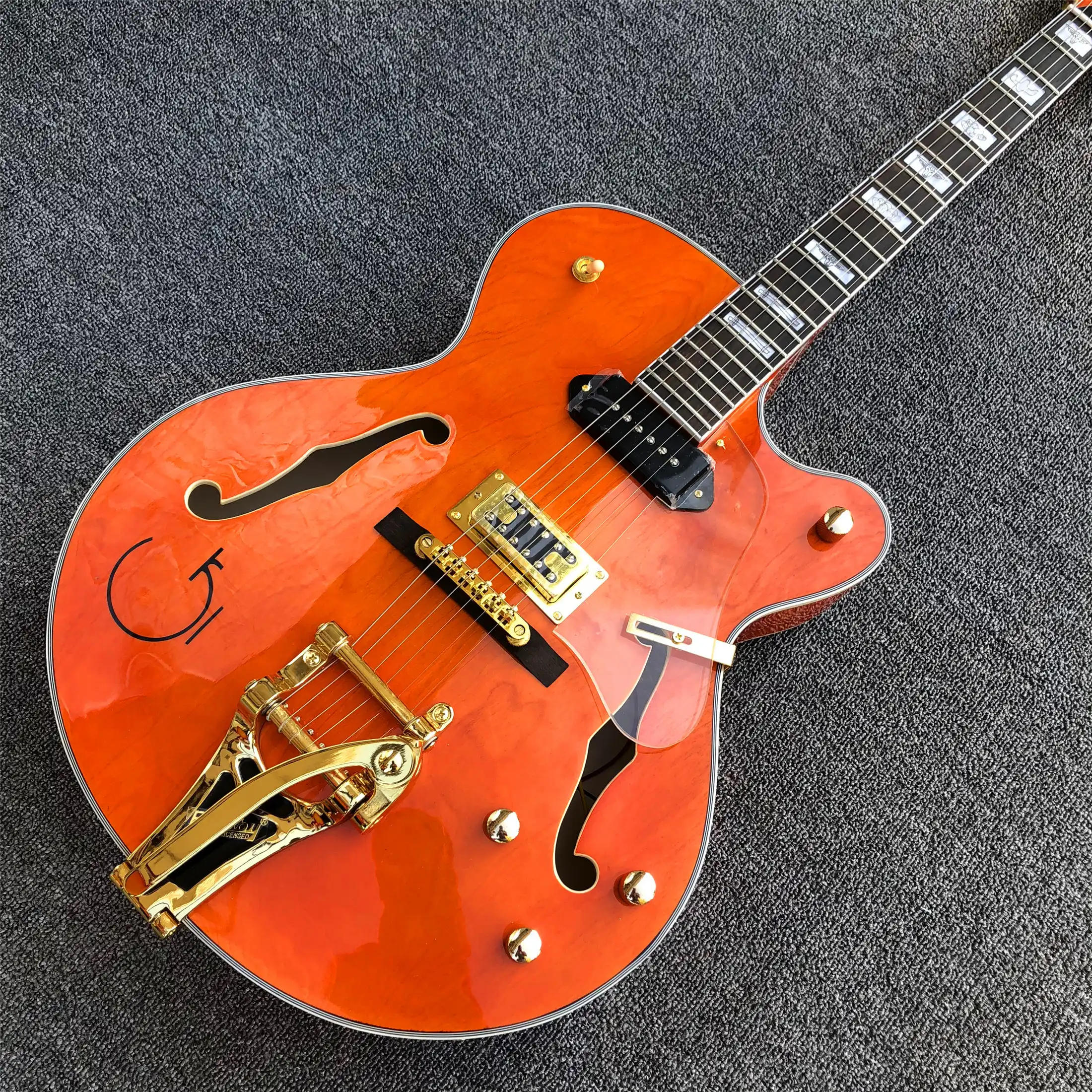 top quality g orange electric jazz guitar,gold bigsby bridge
